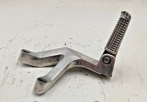 Left rear footpeg support - support,