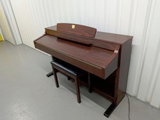 Yamaha Clavinova CLP-330 Digital Piano and stool in mahogany stock #25504