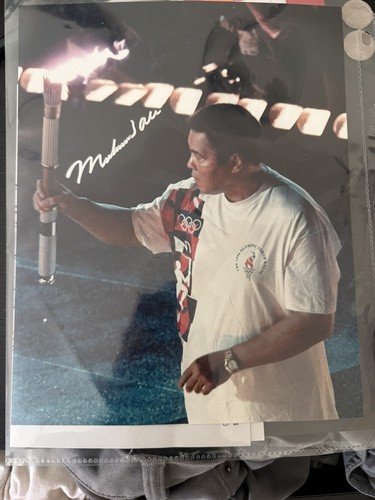 Ali passing torch signed - torch,