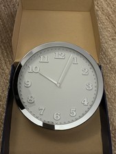 Ms. Chrome Karlsson Wall Clock