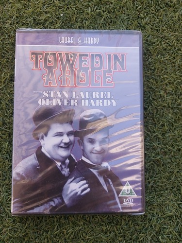 Laurel and hardy towed a - laurel,