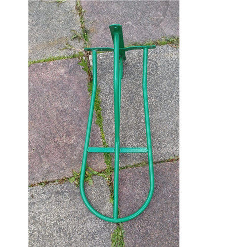 Green metal saddle rack - saddle,