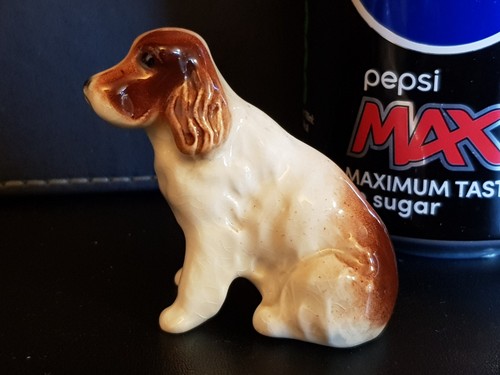 Beswick seated spaniel dog - -,