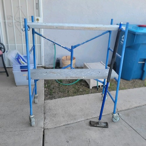 Blue metal scaffold tower with - blue,