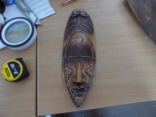 African wooden wall - , mask
