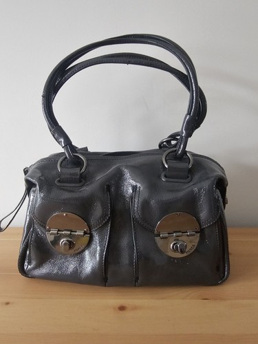 Mimco turnlock zip patent - mimco,