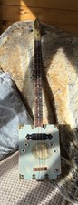 Three string cigar box guitar