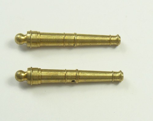 Cannon barrels pack brass - of, 2