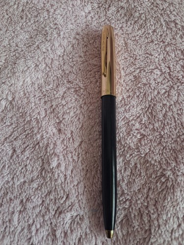 Fisher black and gold - and,