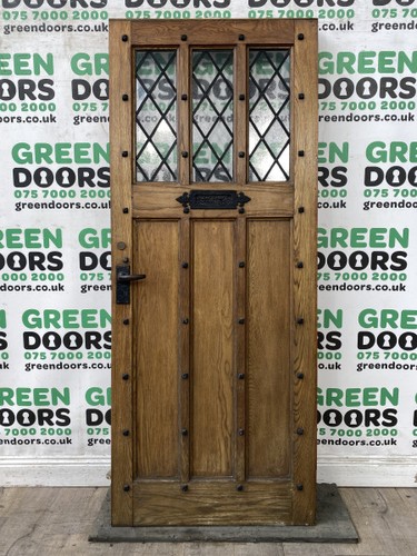Studded oak front door 1930s - front,
