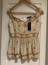 Sleeveless Embellished Top By