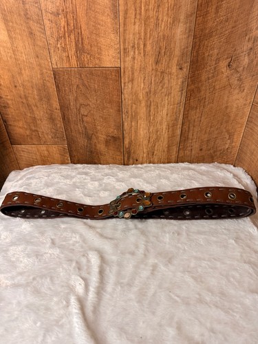Brown embellished eyelet belt