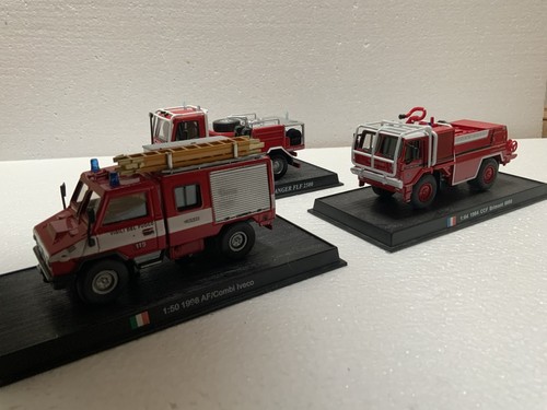 Three fire fighting vehicles - three,