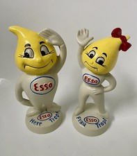 Pair Of Esso Cast Iron Oil