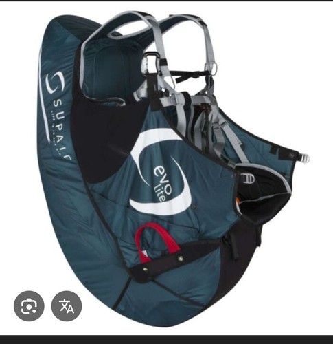 Paraglider and harness - and,