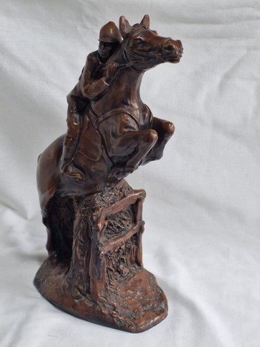 Brown coloured horse - coloured, and