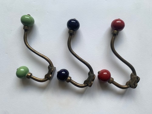 Three brass and ceramic orb - three,