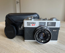 Ricoh 35 ZF 35mm Film Camera with Leather Case and lens cap. Working , untested.