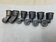 Antique Brass Cup Castors.