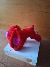 Vintage red dog plush toy from