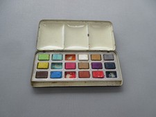 Vintage little black tin