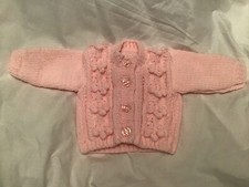 Babies Aran cardigans.