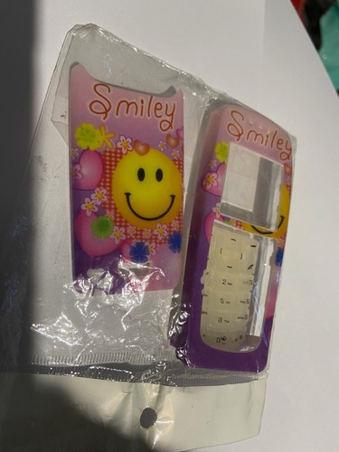 Nokia 3120 front back smiley - nokia,