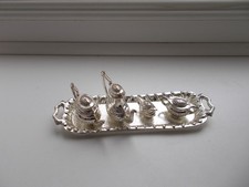 MINIATURE SILVER PLATED DOLLS