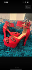 Red standout high heeled strappy shoes club/pub/pole dance