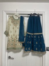 Asian (Indian) teal blue white