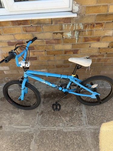 Blue bmx bike likely a - blue, is
