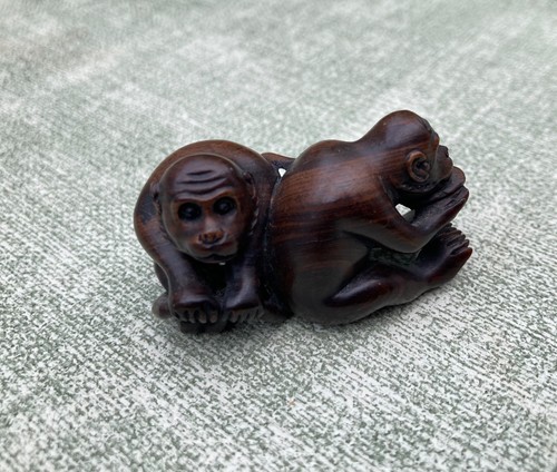 Netsuke depicting seated - depicting, 2