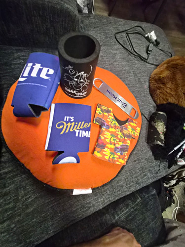 Koozie and blue moon bottle - and,