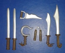 2003 * 7 x SEWER LAIR WEAPONS FOR FIGURES * TEENAGE MUTANT NINJA TURTLES TMNT