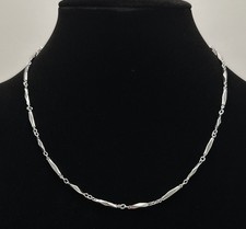 Signed Nikken Silver Tone