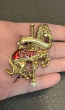 1928 Brand Gold Tone Carousel