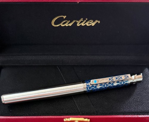 Cartier silver and blue star