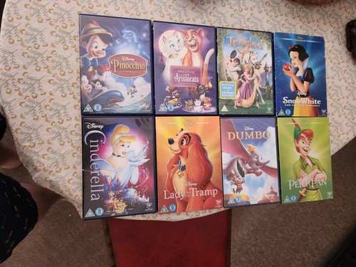 Disney dvds including dumbo - 8,