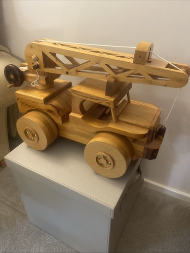 Wooden working toy crane - working, hand