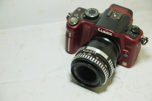 50mm lens 100mm - 50mm=,