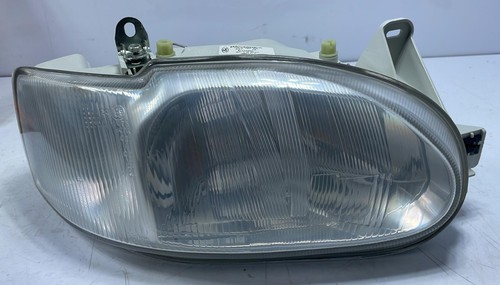 Original right front headlight - original,