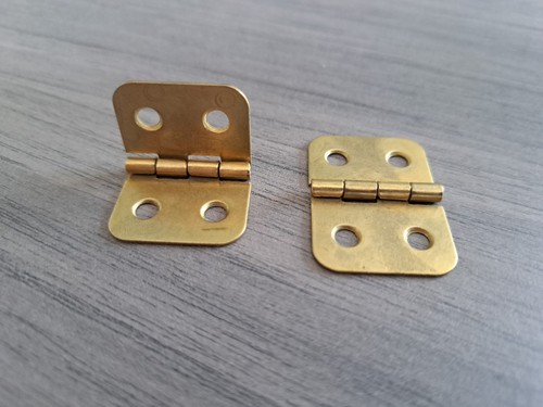 Pair small strong brass - of,