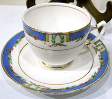 ROYAL ALBERT, ORIENTAL TEA CUP AND SAUCER, SOME WEAR