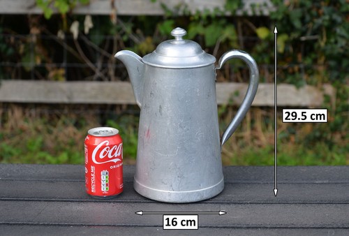 Vintage old aluminium milk