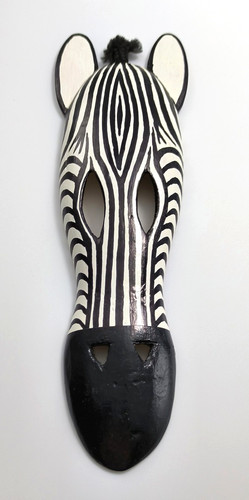 Hand carved wooden zebra - hand,