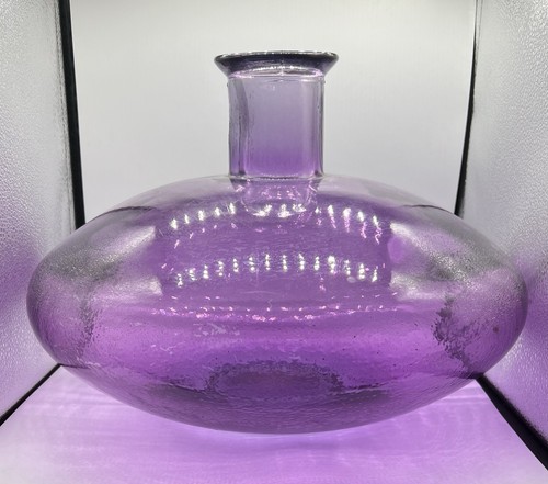 Massive amethyst colored glass - massive,
