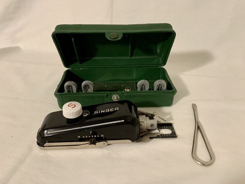 Singer sewing machine button - singer,
