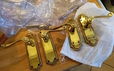 Two brass georgian door handle