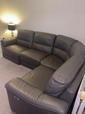 Charcoal grey leather corner couch, used. 2 electric recliners 