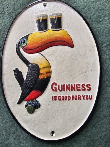 Guinness cast iron - iron, wall